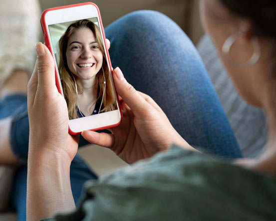 teen video chatting on phone